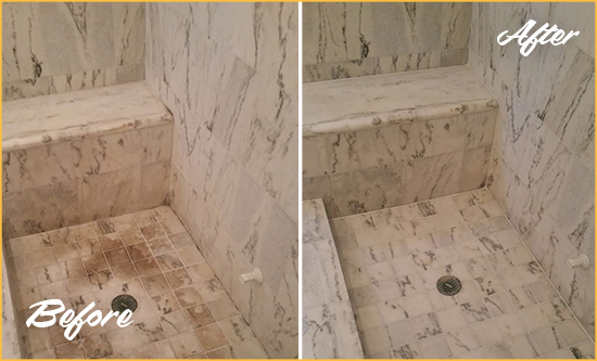 Before and After Picture of a Dirty Gambrills Marble Shower Cleaned to Eliminate Dark Stains